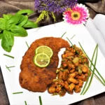 Pfifferlinge mit Schnitzel in Erdnusspanade Rezept