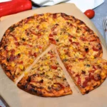 Pizza mit Reis Rezept frisch aus dem Ofen