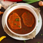 Saftige Koteletts in Paprika-Zwiebel-Soße-Rezept-ballesworld